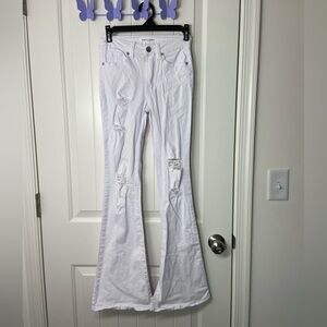 EUC Almost Famous‎ women’s solid white flare ripped distressed stretch jeans 0